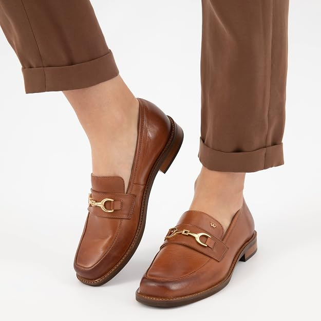 Cognac brown loafers with gold-tone hardware
